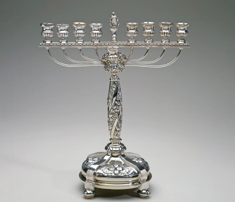 Hanukkah Lamp, Gebrüder Gutgesell (active 1903–26), Hanau (Germany), 1903–26, silver: cast, repoussé, spun, and parcel-gilt, 16 1/8 x 13 1/2 x 8 1/8 in. (41 x 34.3 x 20.7 cm). The Jewish Museum, New York. Gift of Mrs. Jules Lubell in memory of her parents, Regina and Leo Frisch, 1997-39