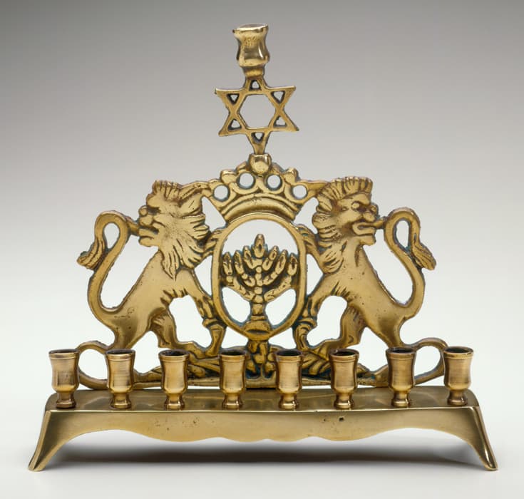 Hanukkah Lamp, United States, first half 20th century, copper alloy: cast, 7 1/2 x 8 1/8 x 2 1/8 in. (19.1 x 20.7 x 5.5 cm). The Jewish Museum, New York. Gift of Dr. Harry G. Friedman, F 1134