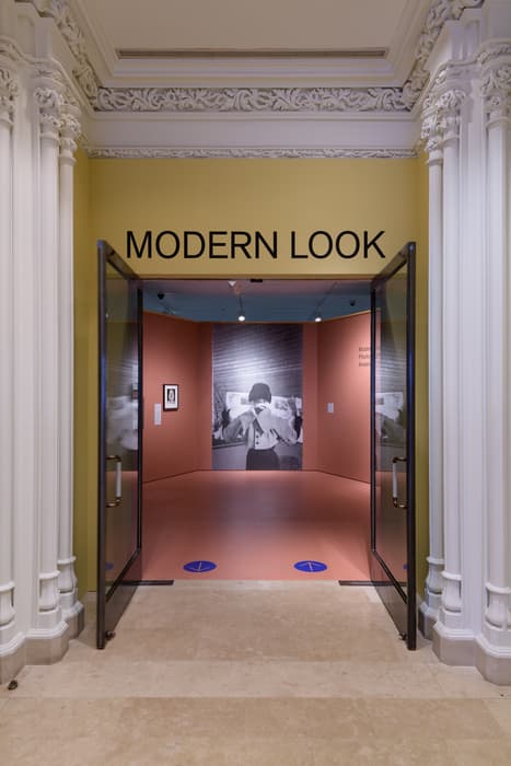 View of an exhibition entrance titled 