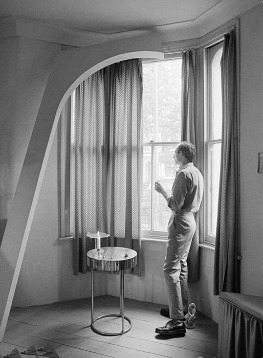 Marc Camille Chaimowicz, Man Looking Out of Window (for SM), 2006. Black-and-white resin print on aluminum. Image courtesy of the artist, Cabinet, London and Andrew Kreps Gallery, New York
