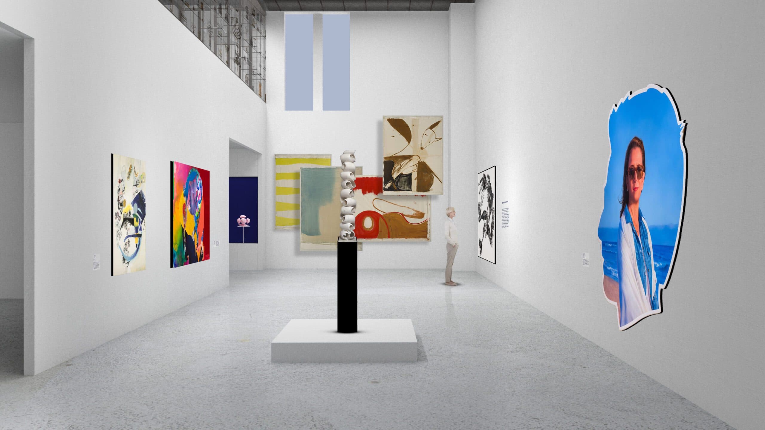 Contemporary museum gallery with colorful abstract paintings, a stacked white sculpture on a black pedestal, and a large photographic cutout of a woman at the beach, with a visitor viewing text on the wall.
