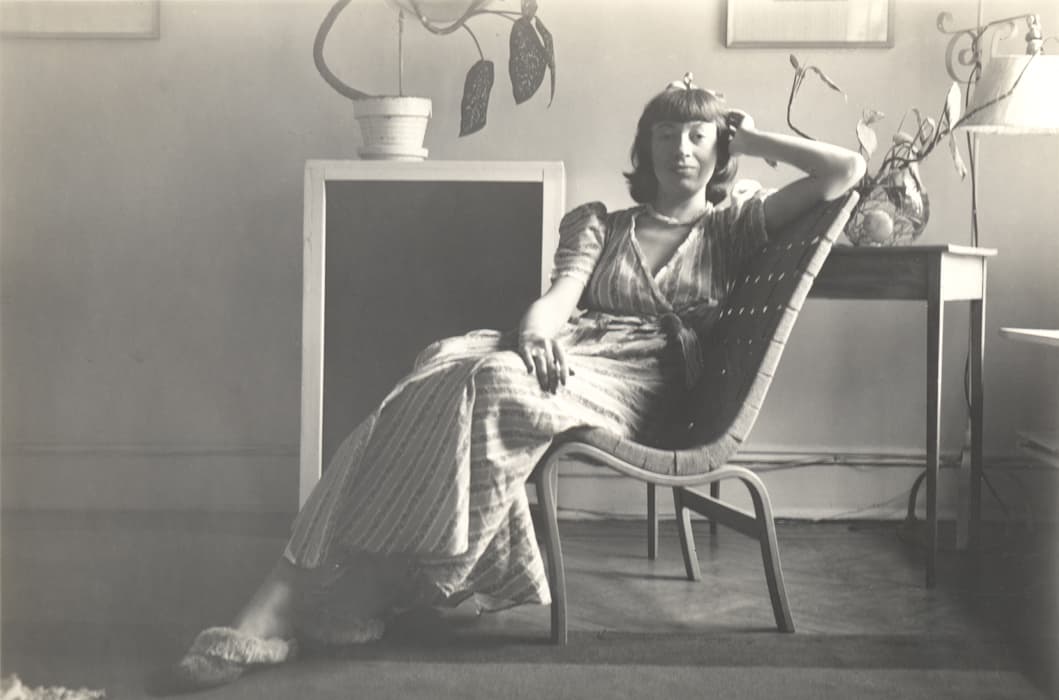 Maurice Berezov. Lee Krasner, New York, c. 1940, Copyright A.E. Artworks.

While studying at the prestigious National Academy of Design, Krasner met the Russian émigré, Igor O. Pantuhoff (1911 – 1972). They lived together for a few years, to the extent that Krasner's parents thought they were married. Pantuhoff later became known for charming doe-eyed portraits of young women. In the early thirties, Krasner worked at Sam Johnson', a nightclub haven for artists and intellectuals in Greenwich Village and later earned money as a model. Confident and calm, reclining in her Brooklyn studio, Krasner presents herself here as a stylish young woman, an elegant bohemian.